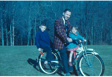 Dad on bike before image enhancing